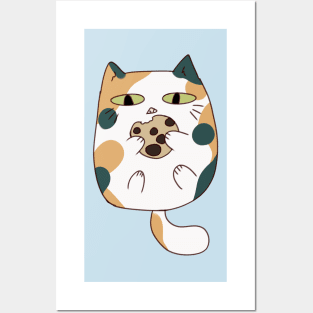 Calico cat eating cookie Posters and Art